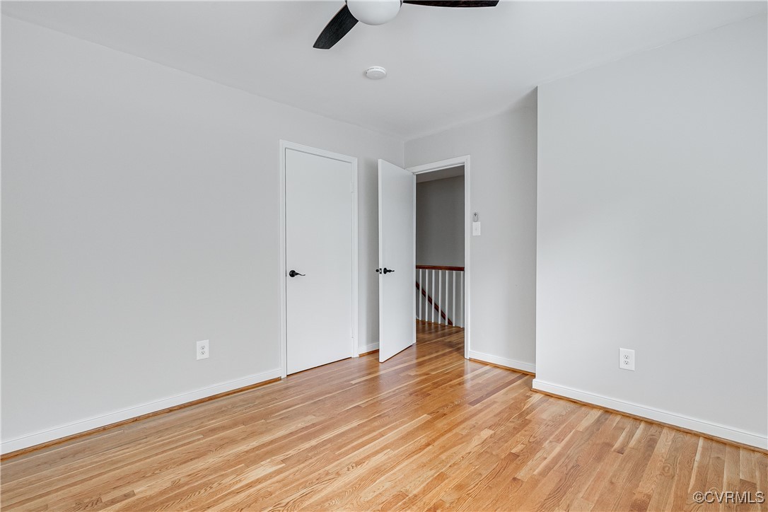 10231 Epsilon Road Richmond, VA 23235 - Photo 30 of 42 a view of an empty room with wooden floor