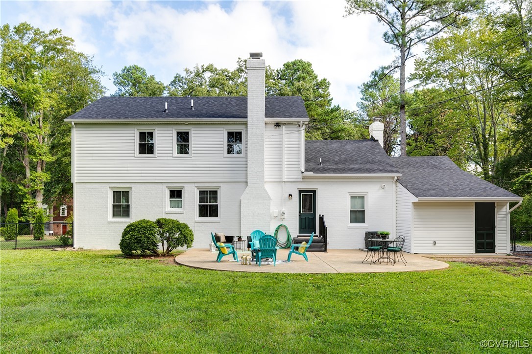 10231 Epsilon Road Richmond, VA 23235 - Photo 36 of 42 a front view of house with yard and outdoor seating