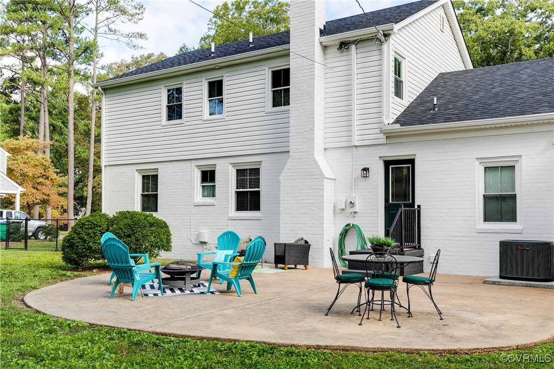 10231 Epsilon Road Richmond, VA 23235 - Photo 37 of 42 a view of backyard with outdoor seating a patio and plants