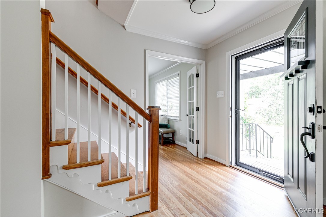 10231 Epsilon Road Richmond, VA 23235 - Photo 4 of 42 a view of entryway and hall with wooden floor