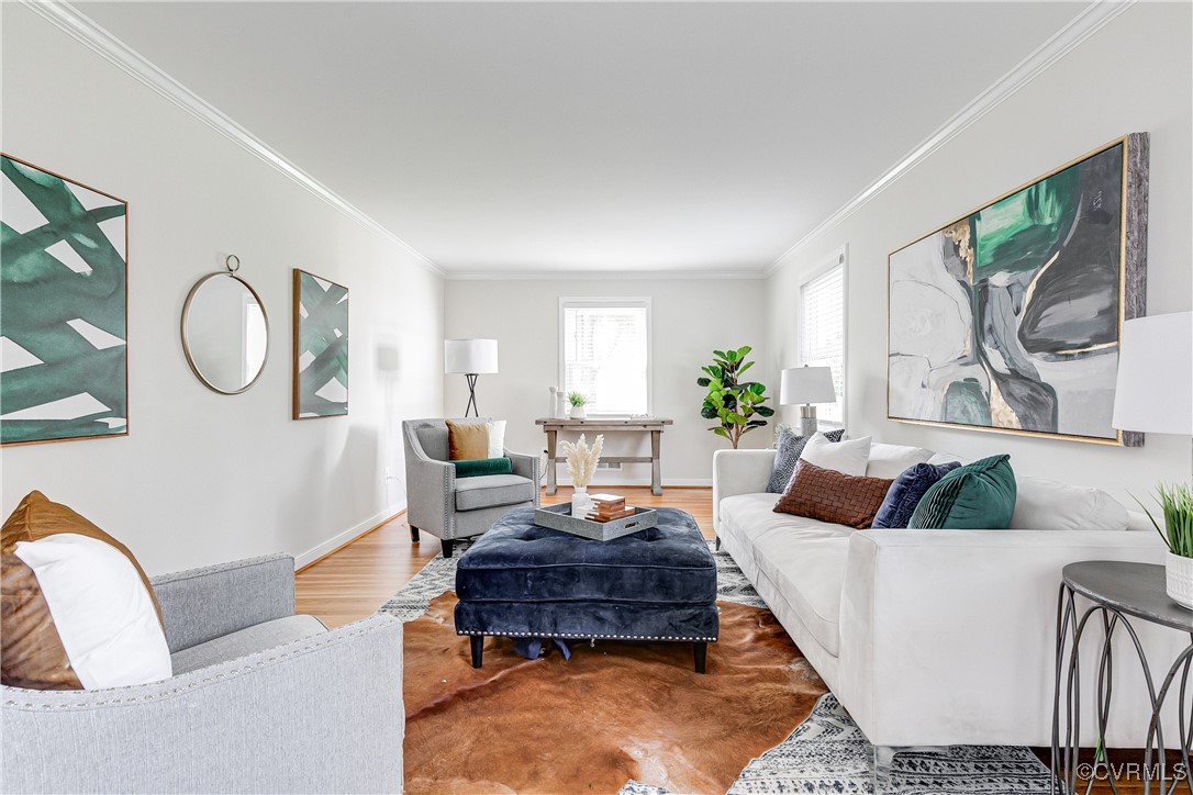 10231 Epsilon Road Richmond, VA 23235 - Photo 6 of 42 a living room with furniture and a large window