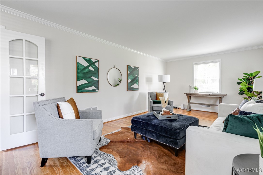 10231 Epsilon Road Richmond, VA 23235 - Photo 7 of 42 a living room with furniture and a potted plant