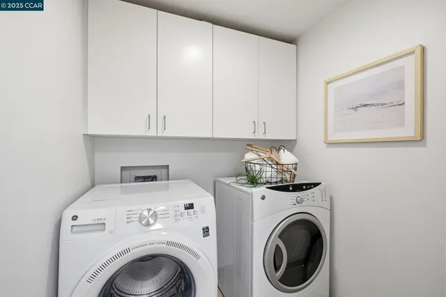 a bathroom with a shower and a glass door