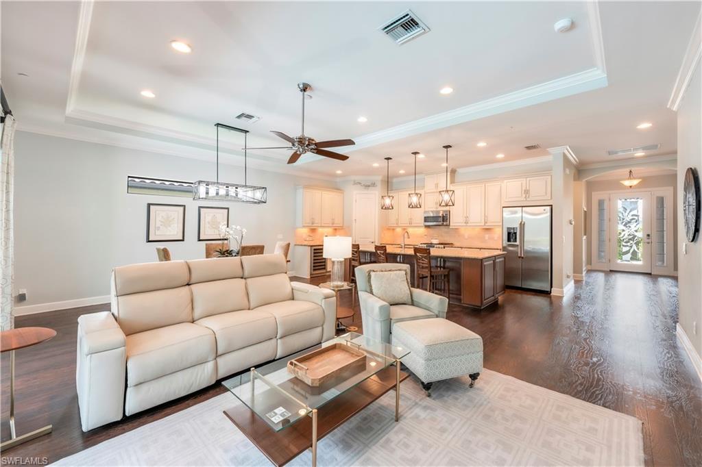 23778 Pebble Pointe Lane Estero, FL 34135 - Photo 13 of 35 a living room with furniture and kitchen view