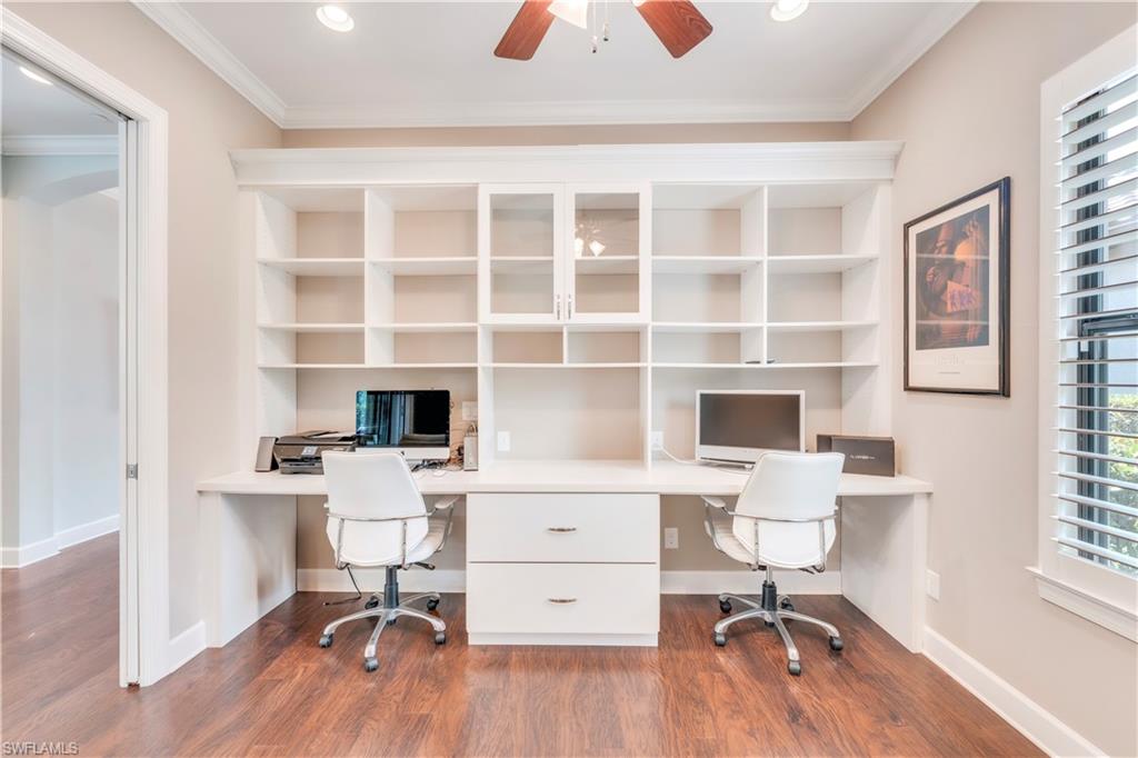 23778 Pebble Pointe Lane Estero, FL 34135 - Photo 19 of 35 a view of a workspace with furniture and a window