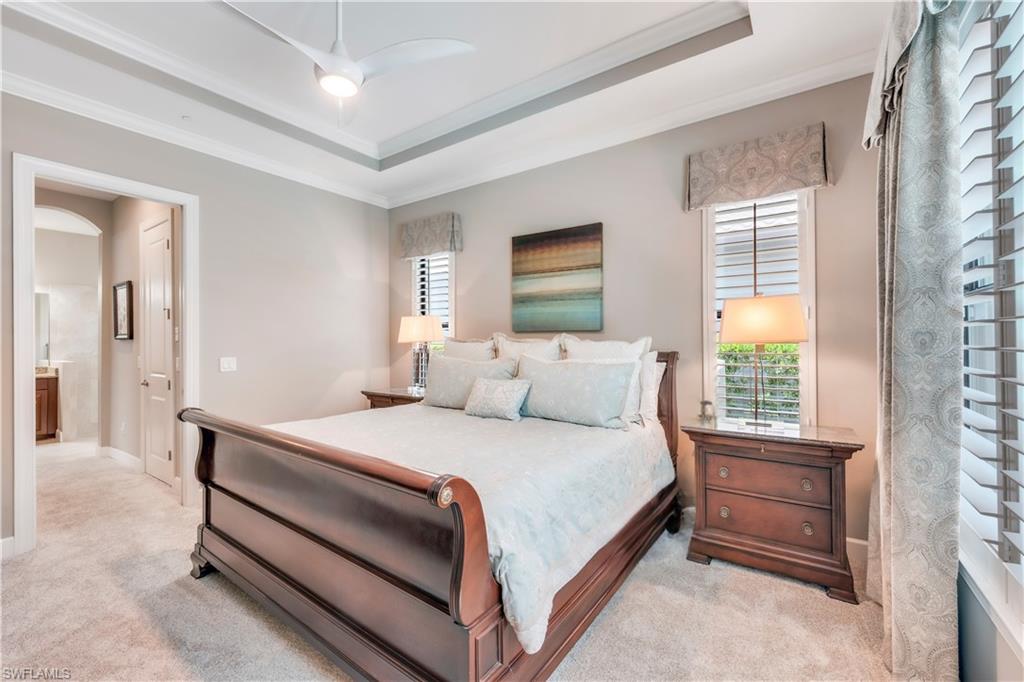 23778 Pebble Pointe Lane Estero, FL 34135 - Photo 21 of 35 a bedroom with a bed and a window