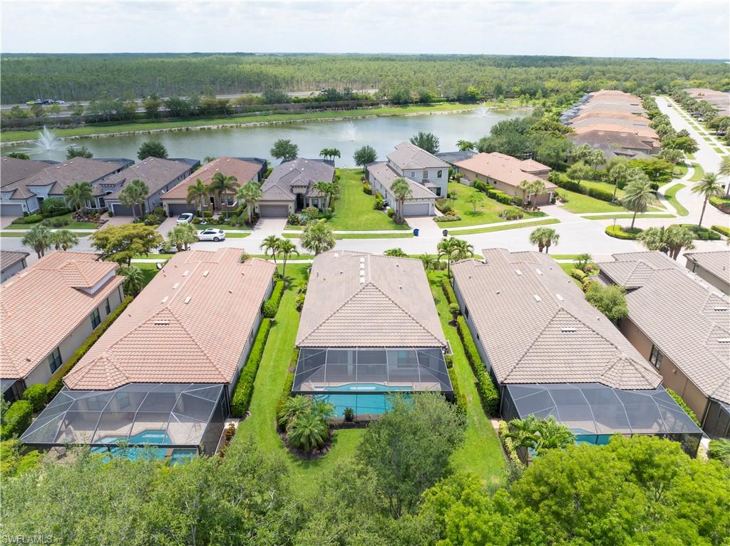 23778 Pebble Pointe Lane Estero, FL 34135 - Photo 35 of 35 an aerial view of a house with outdoor space and lake view