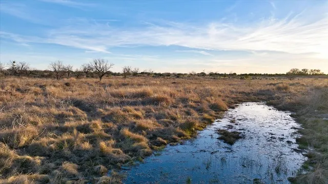 a view of lake with mountain