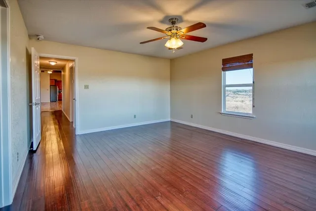 a bathroom with a sink a mirror and a shower
