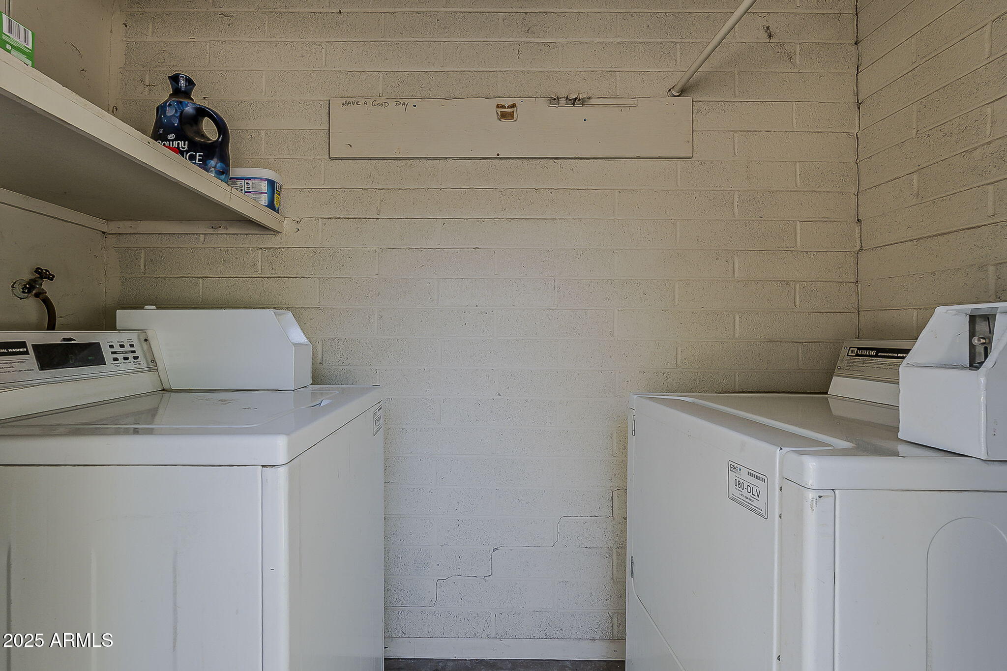 6225 North 10th Place Phoenix, AZ 85014 - Photo 27 of 32 a utility room with dryer and washer