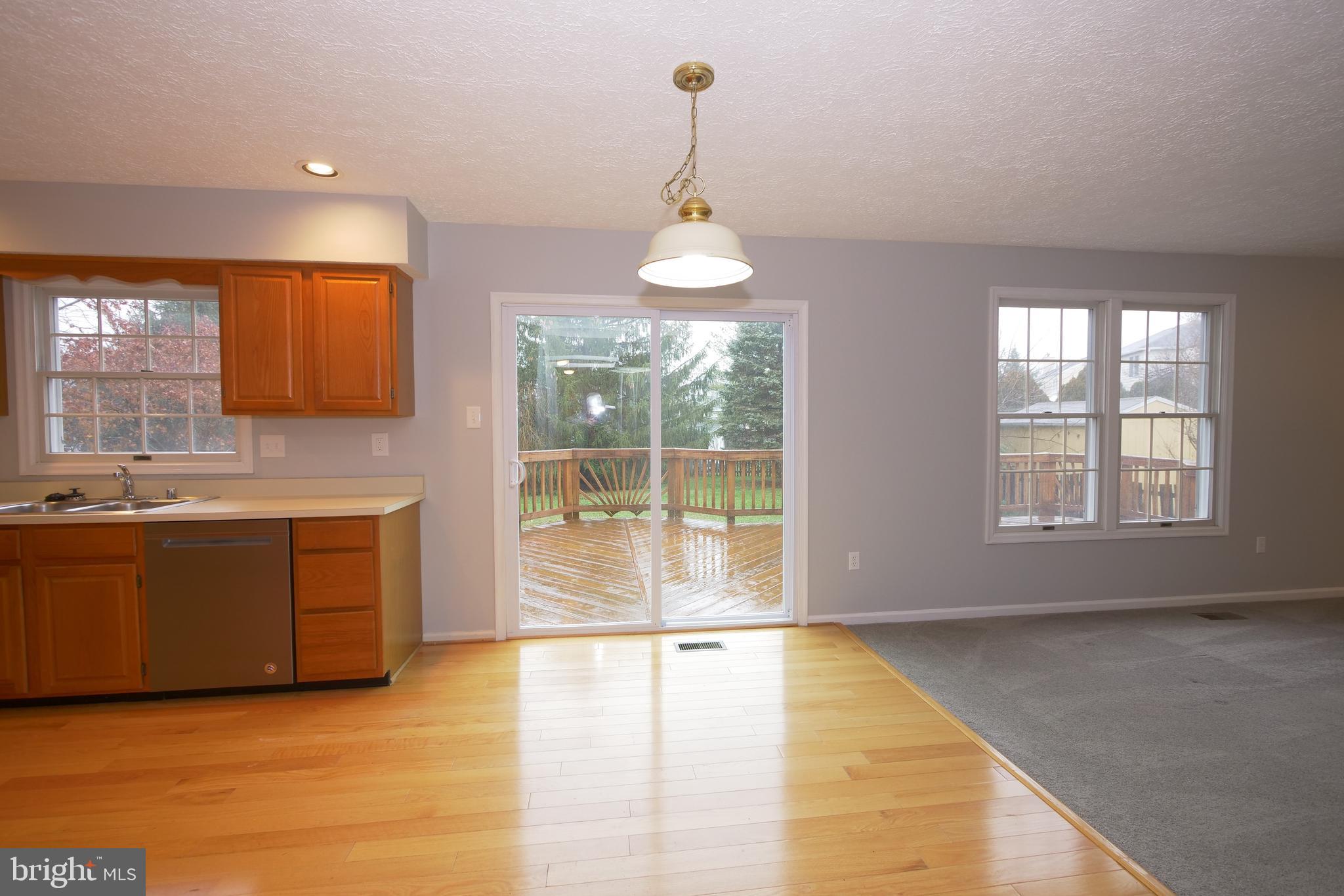 5608 Alysheba Way Frederick, MD 21703 - Photo 15 of 40 Main Level Kitchen with Dining Area