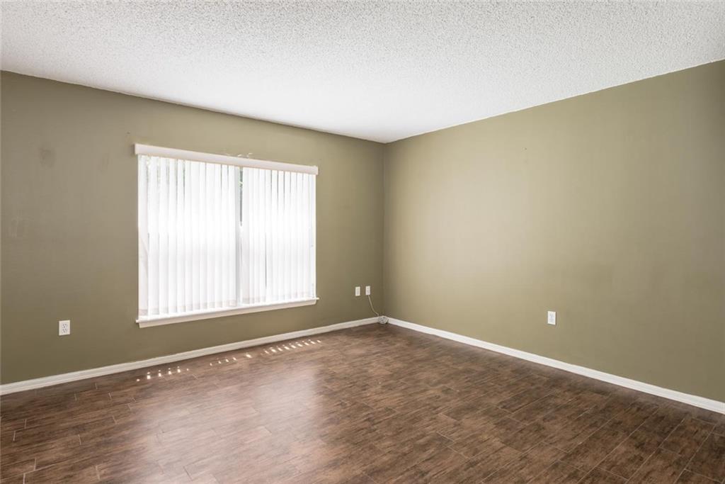 5665 Northwest Whitecap Road Port St. Lucie, FL 34986 - Photo 11 of 25 an empty room with a empty space and a window