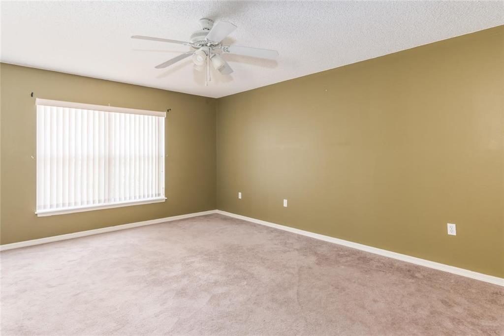 5665 Northwest Whitecap Road Port St. Lucie, FL 34986 - Photo 13 of 25 an empty room with a window