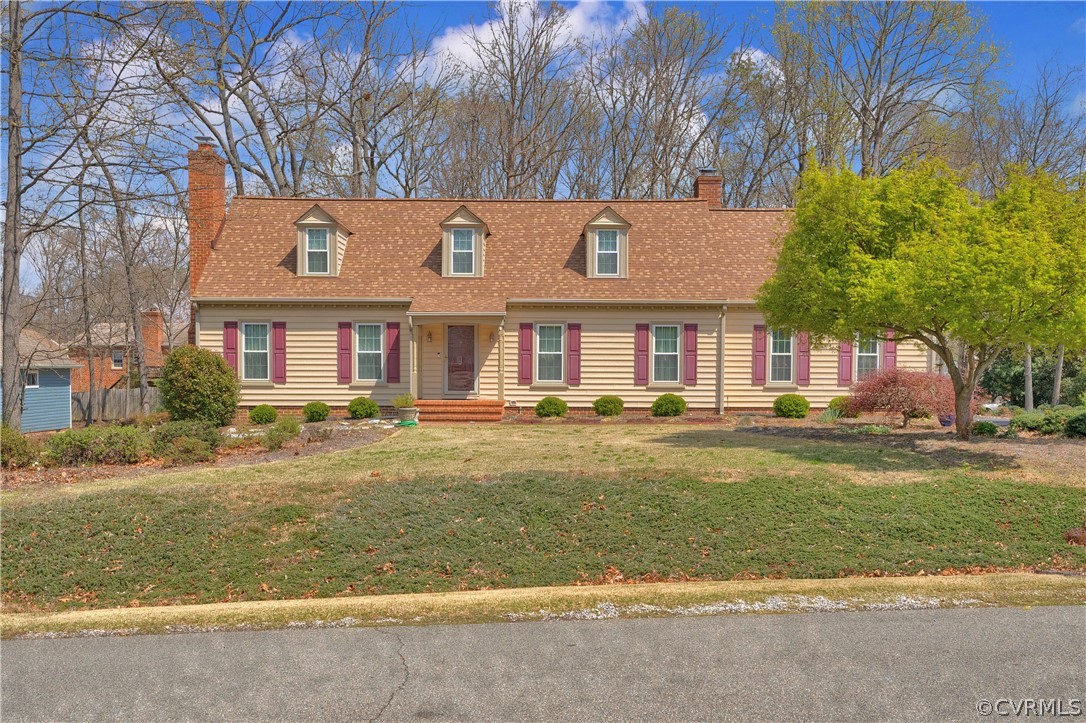 13113 Bluemont Road Chester, VA 23831 - Photo 1 of 41 a front view of a house with a yard