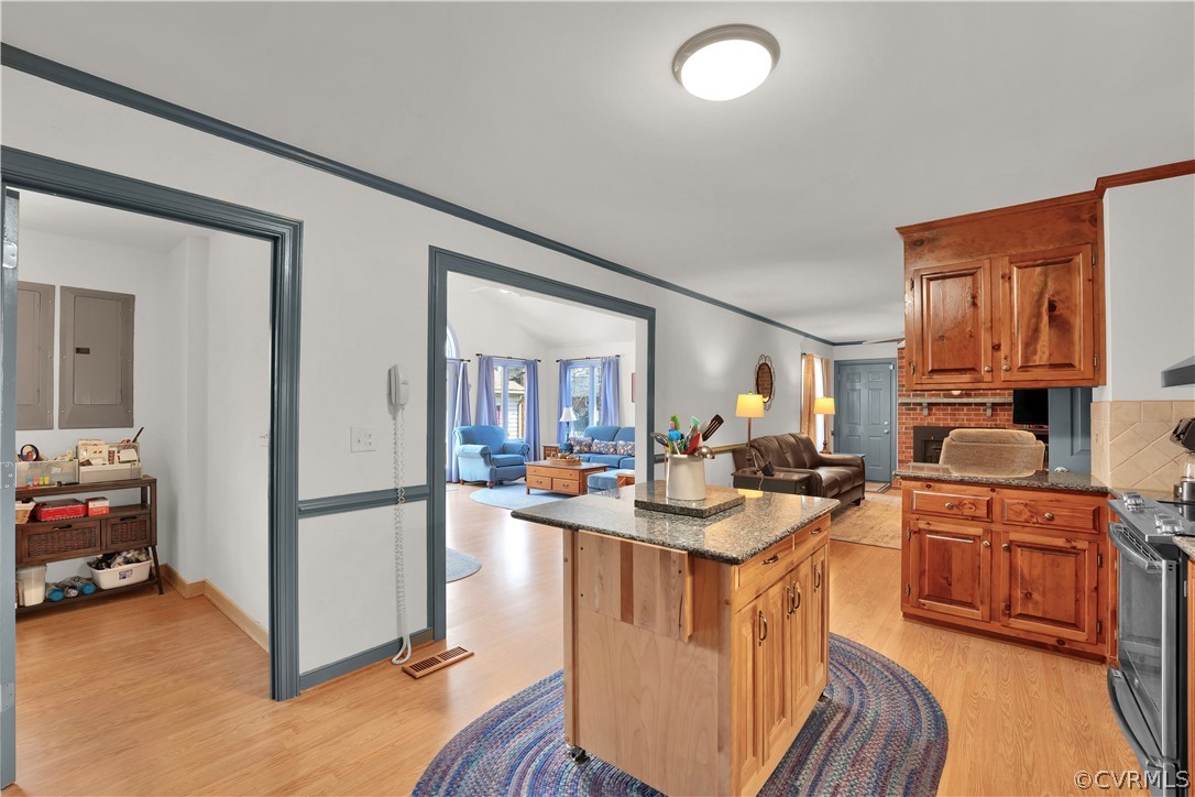 13113 Bluemont Road Chester, VA 23831 - Photo 13 of 41 a kitchen with sink refrigerator and cabinets