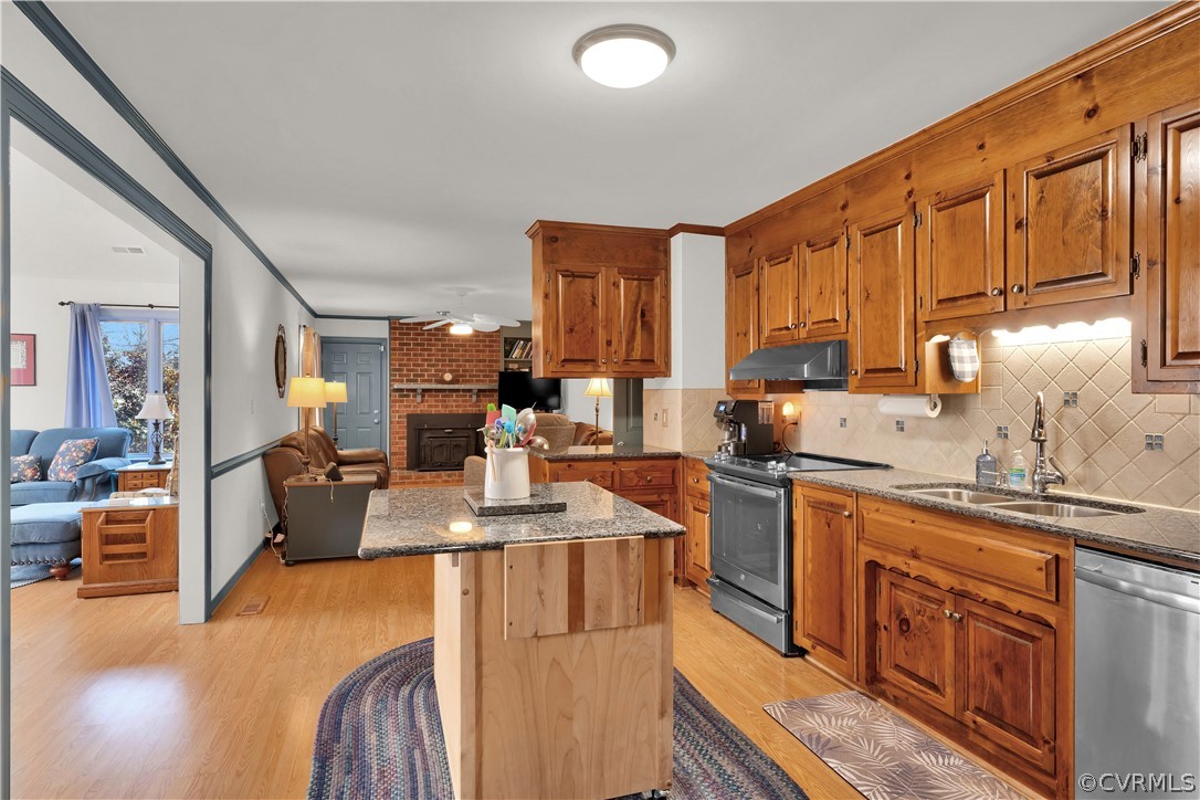 13113 Bluemont Road Chester, VA 23831 - Photo 14 of 41 a kitchen with stainless steel appliances granite countertop sink stove refrigerator and cabinets