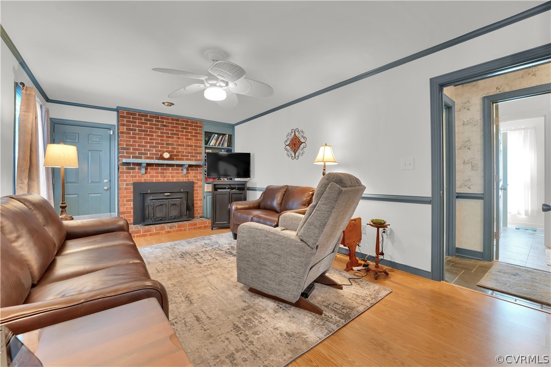 13113 Bluemont Road Chester, VA 23831 - Photo 18 of 41 a living room with furniture and a fireplace