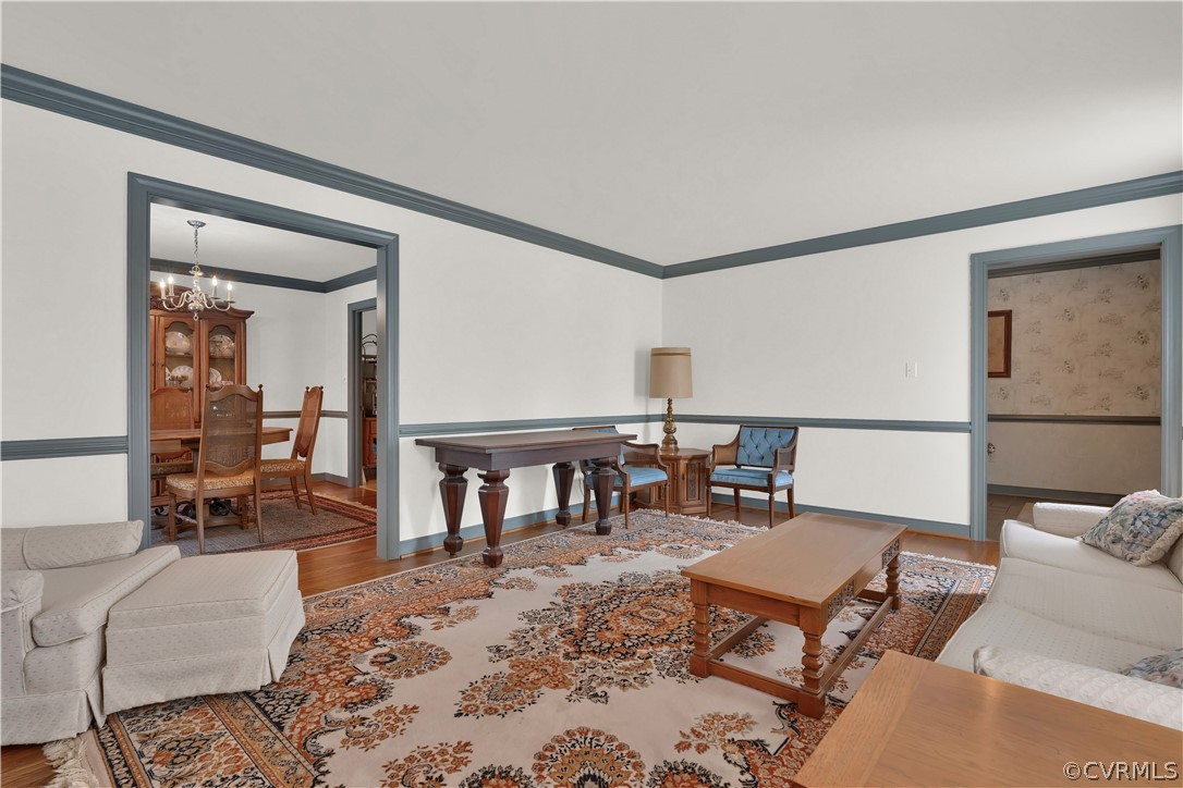 13113 Bluemont Road Chester, VA 23831 - Photo 6 of 41 a living room with furniture and a dining table