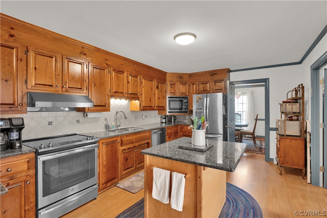13113 Bluemont Road Chester, VA 23831 - Photo 10 of 41 a kitchen with stainless steel appliances granite countertop a stove refrigerator sink and cabinets