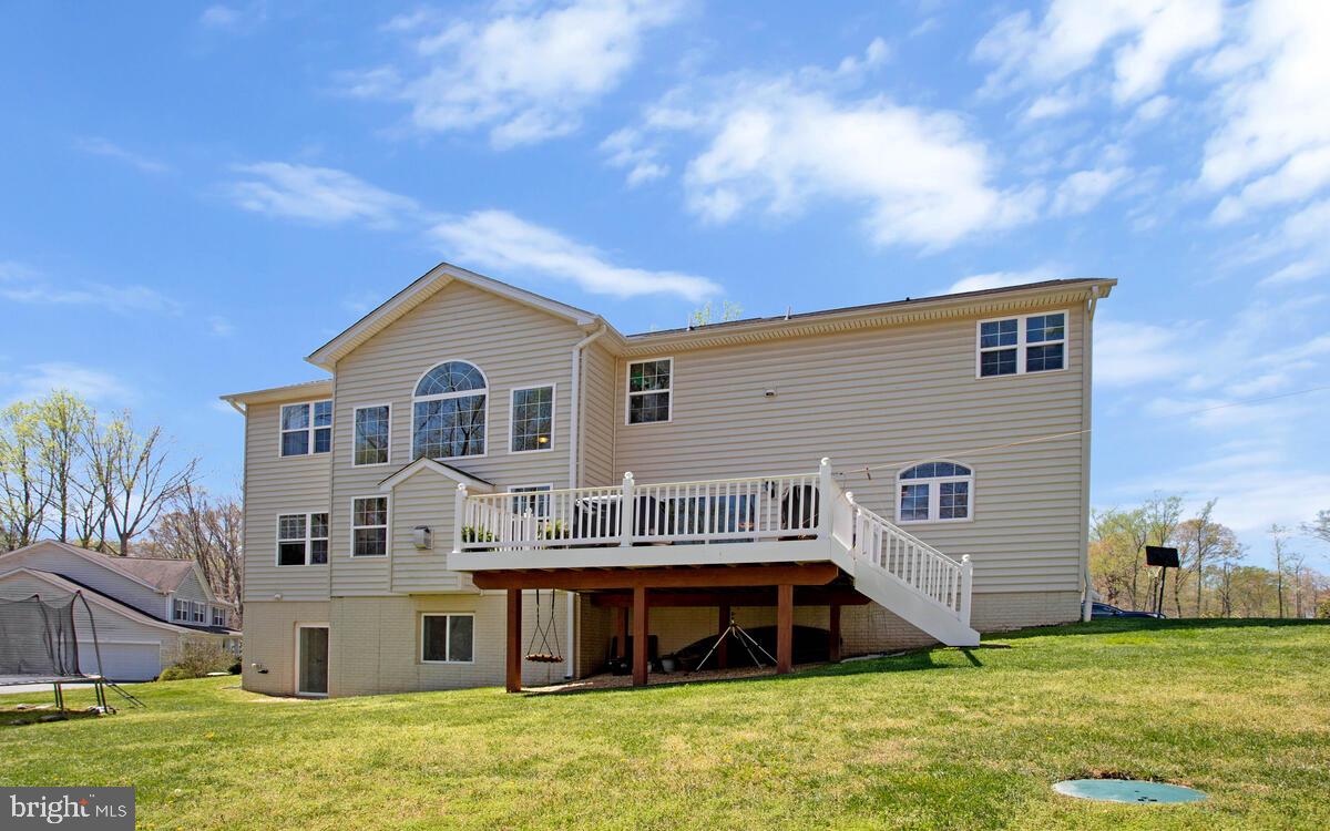 54 Simmons Ridge Road Prince Frederick, MD 20678 - Photo 47 of 55 a front view of a house with a yard