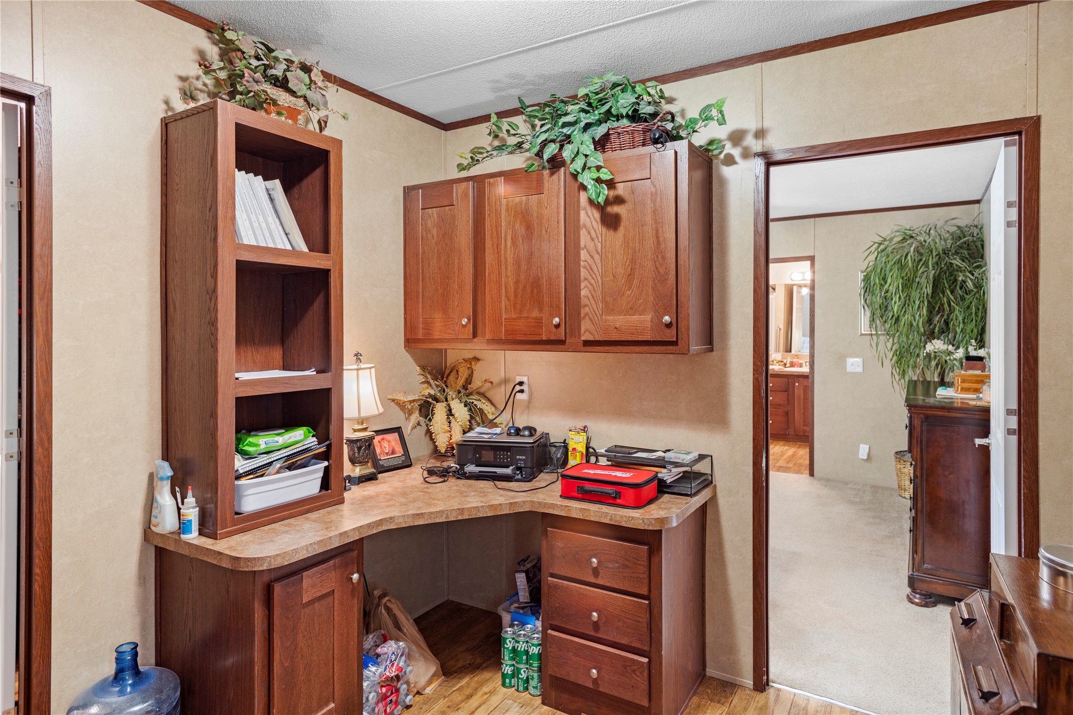 375 Chestnut Bnd Street Huntsville, TX 77320 - Photo 12 of 35 a room that has a bed and a dresser in it