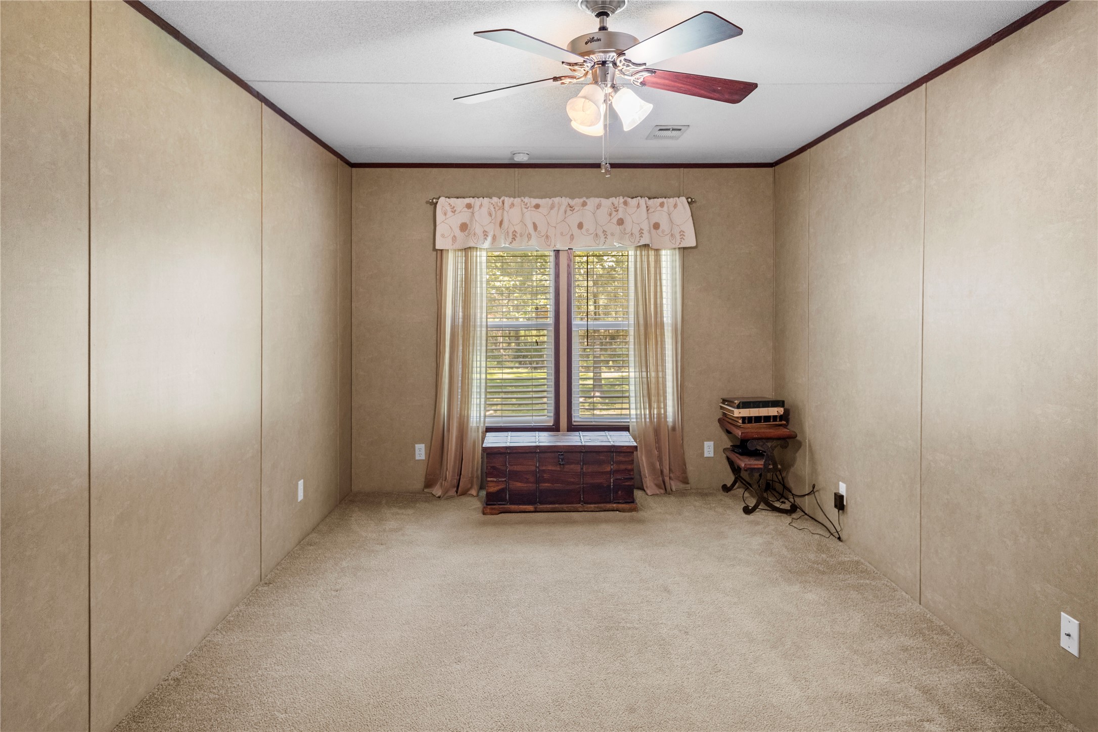 375 Chestnut Bnd Street Huntsville, TX 77320 - Photo 20 of 35 a view of an empty room with a window