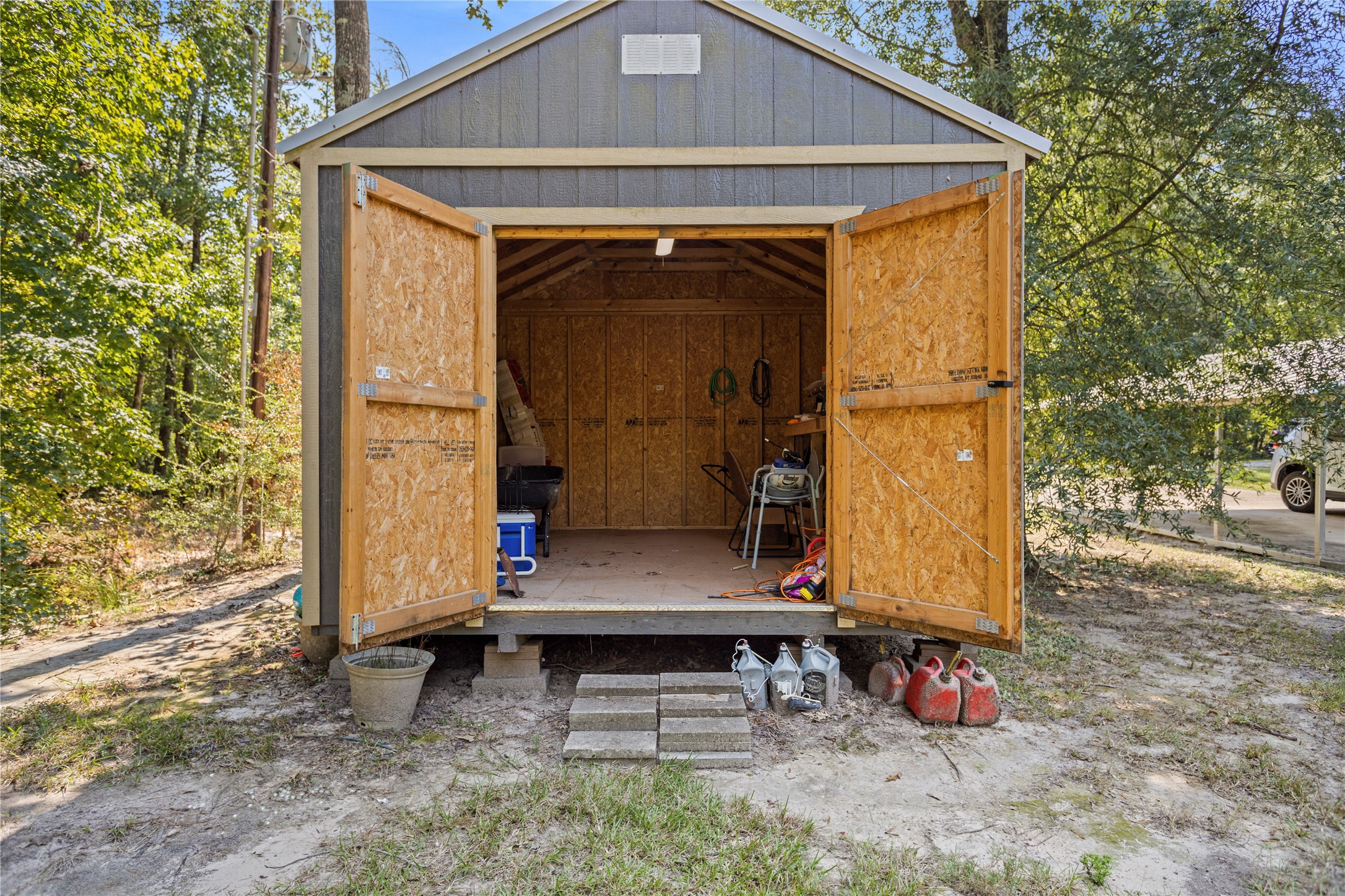375 Chestnut Bnd Street Huntsville, TX 77320 - Photo 27 of 35 a view of house with wooden floor and yard
