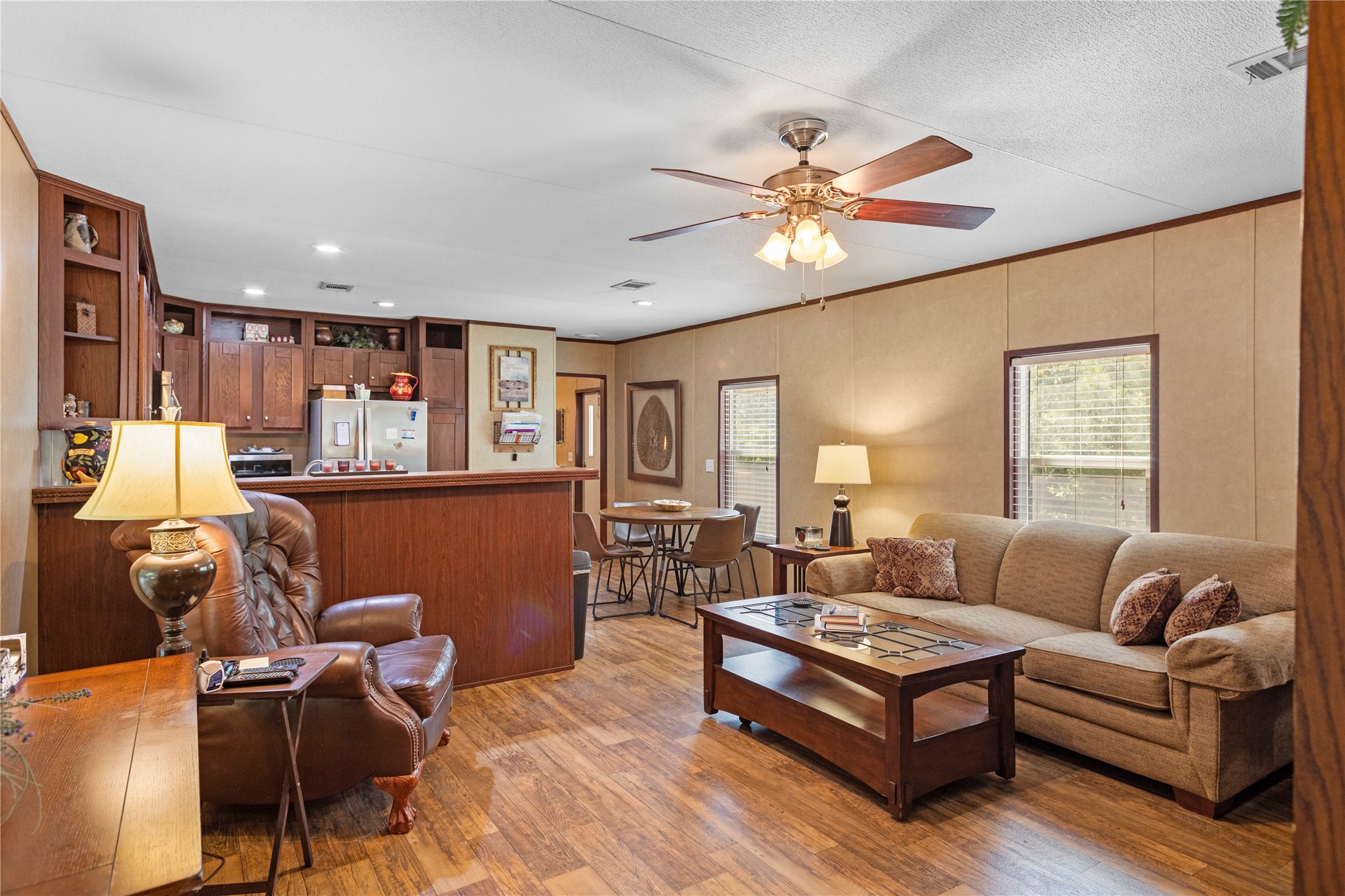 375 Chestnut Bnd Street Huntsville, TX 77320 - Photo 6 of 35 a living room with furniture and a wooden floor
