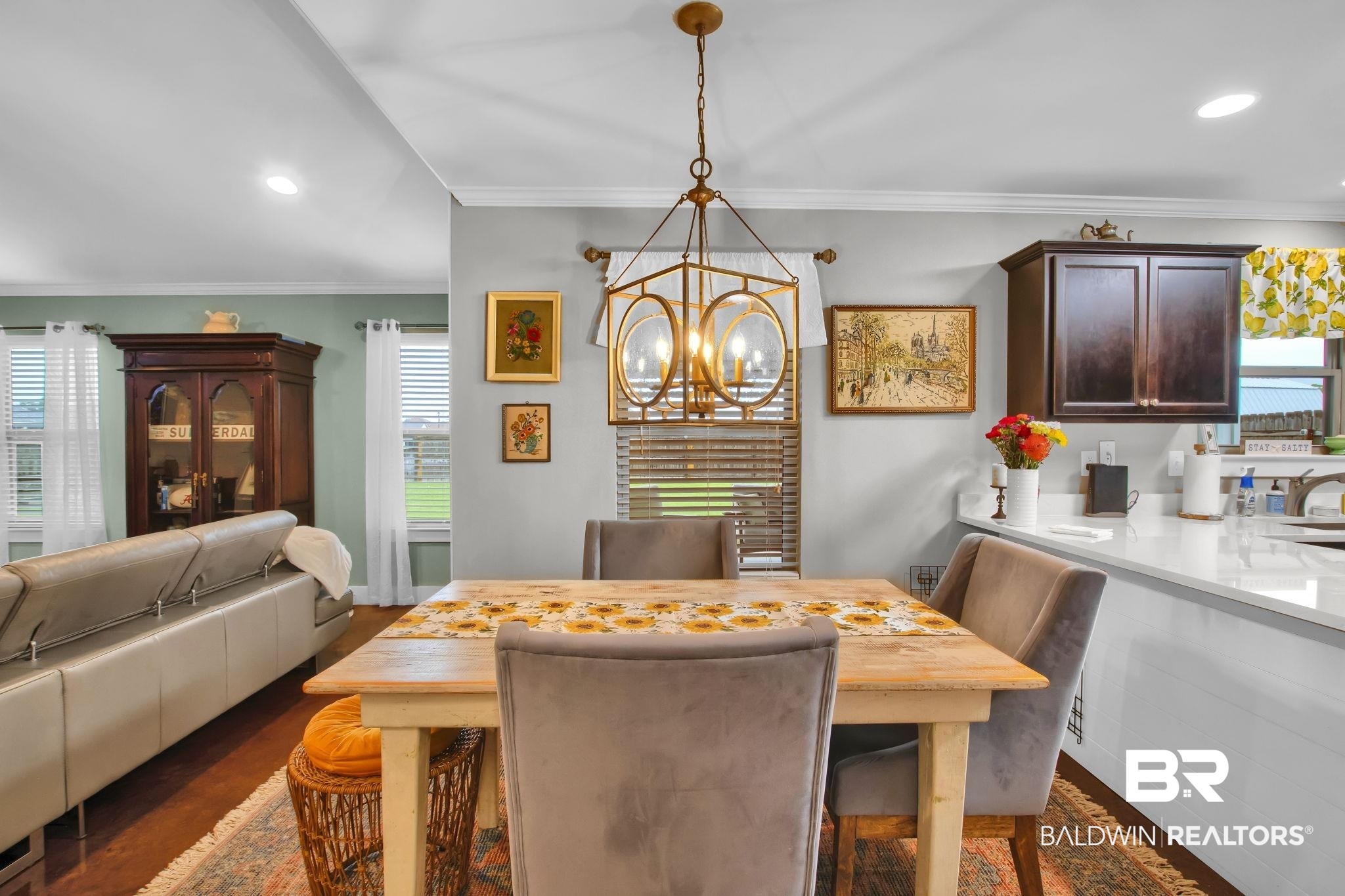 203 Lakefront Circle Summerdale, AL 36580 - Photo 21 of 69 Dining area featuring crown molding, dark hardwood / wood-style flooring, and a notable chandelier