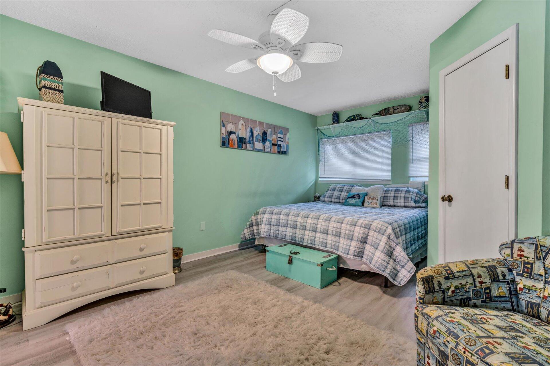 1089 Bluewater Drive, Unit 305 Moneta, VA 24121 - Photo 14 of 41 a bedroom with bed and a large closet