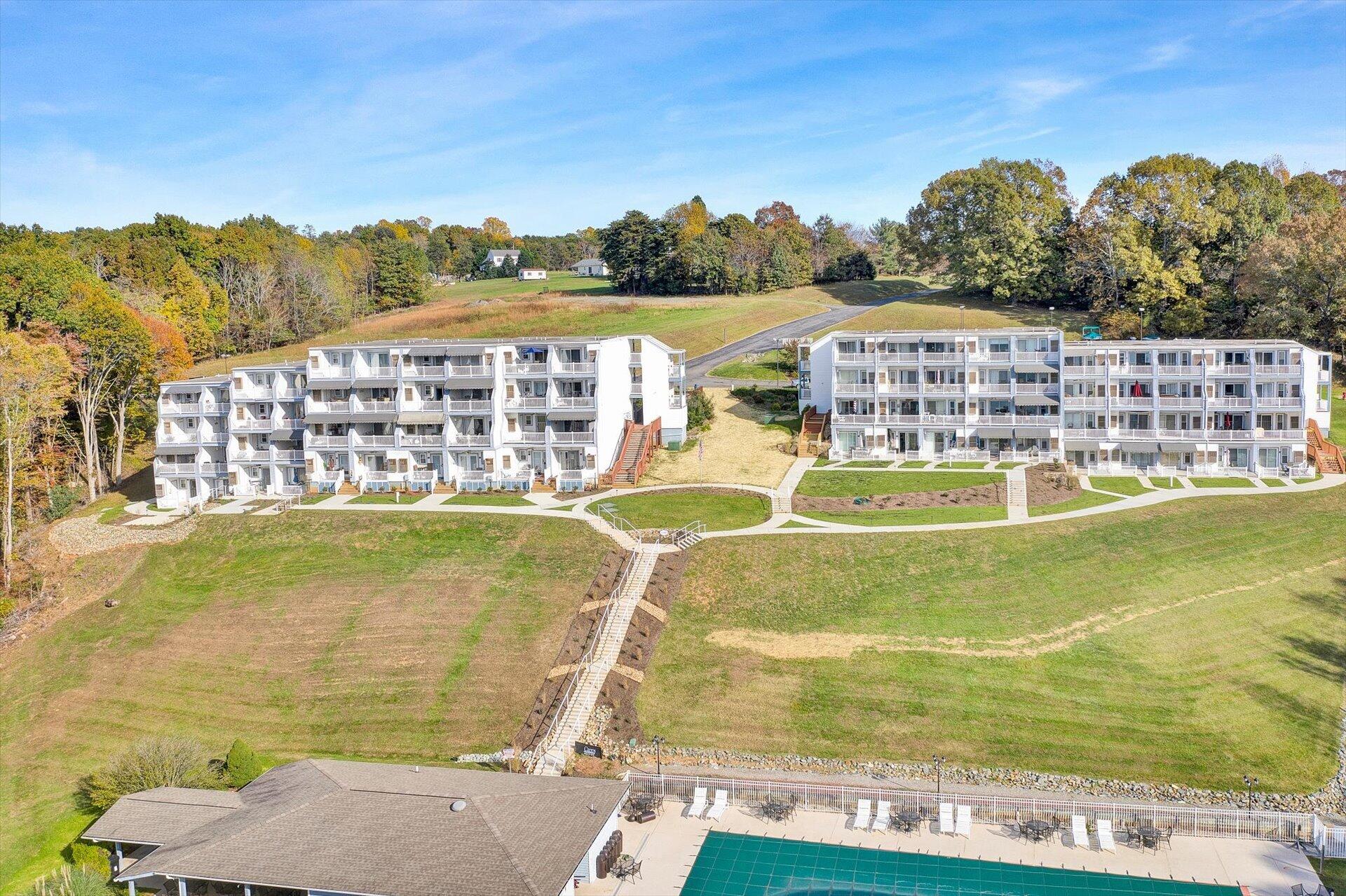 1089 Bluewater Drive, Unit 305 Moneta, VA 24121 - Photo 2 of 41 a view of a swimming pool with an ocean view