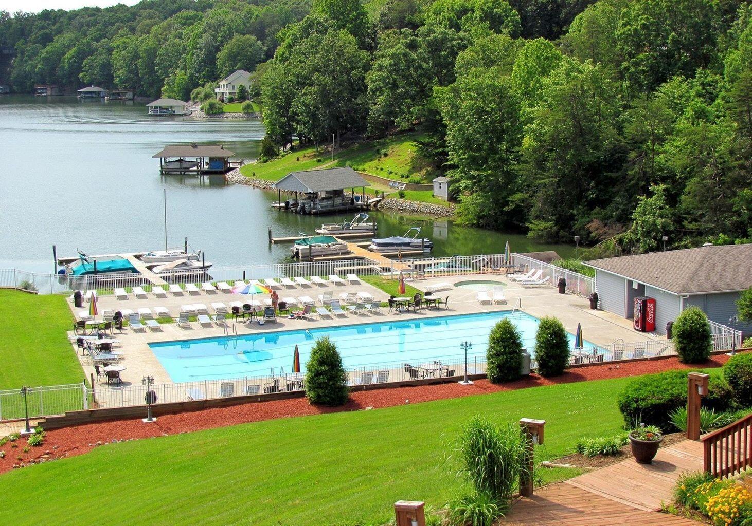 1089 Bluewater Drive, Unit 305 Moneta, VA 24121 - Photo 23 of 41 an aerial view of a house with a garden and swimming pool