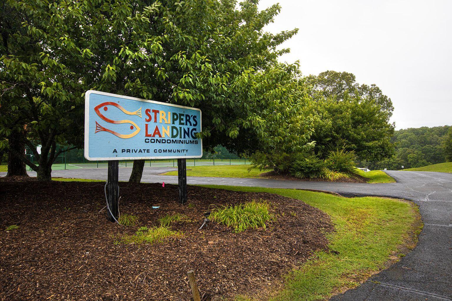 1089 Bluewater Drive, Unit 305 Moneta, VA 24121 - Photo 30 of 41 a sign that is on a brick wall