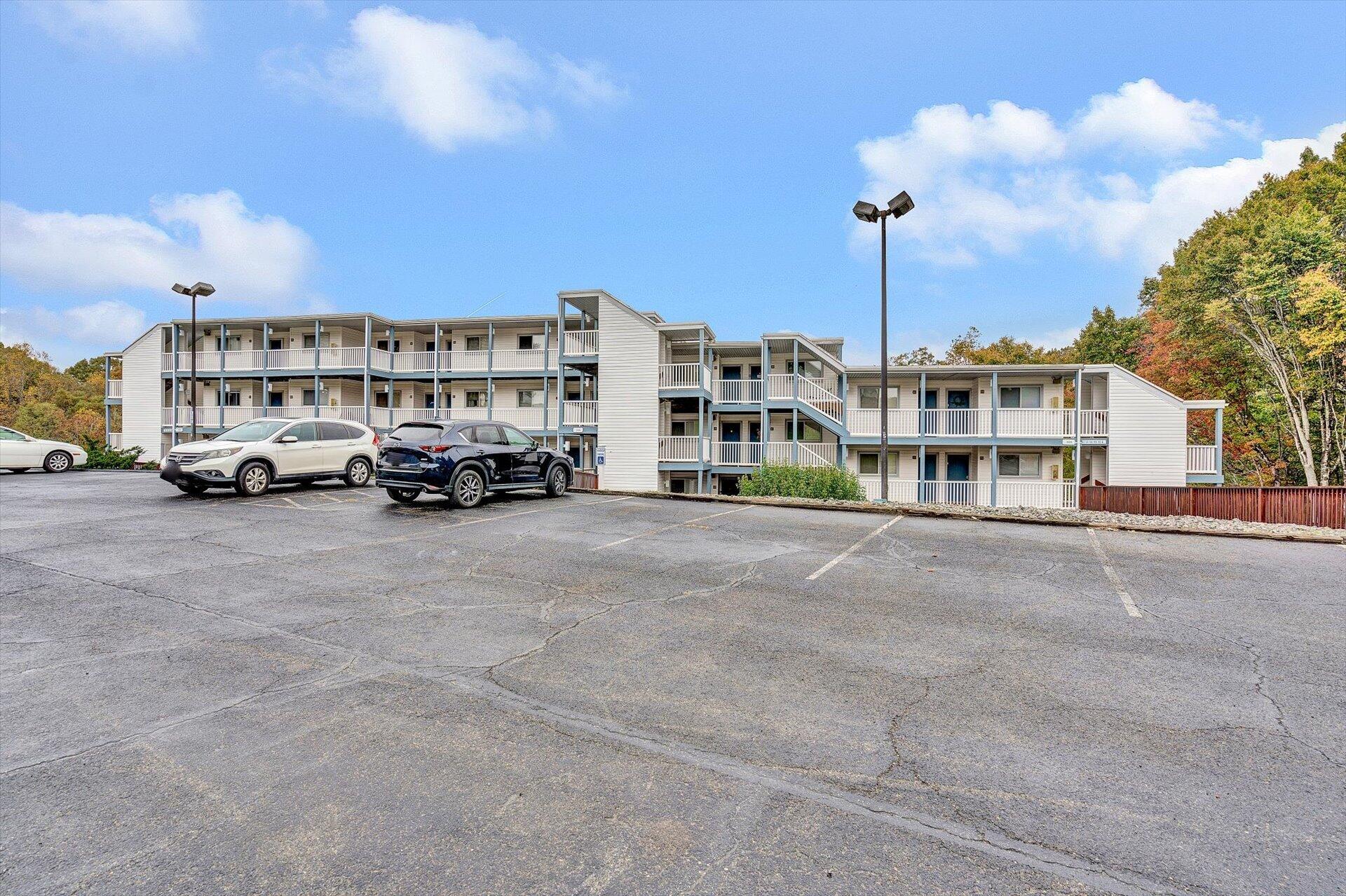 1089 Bluewater Drive, Unit 305 Moneta, VA 24121 - Photo 32 of 41 a car parked in front of a building