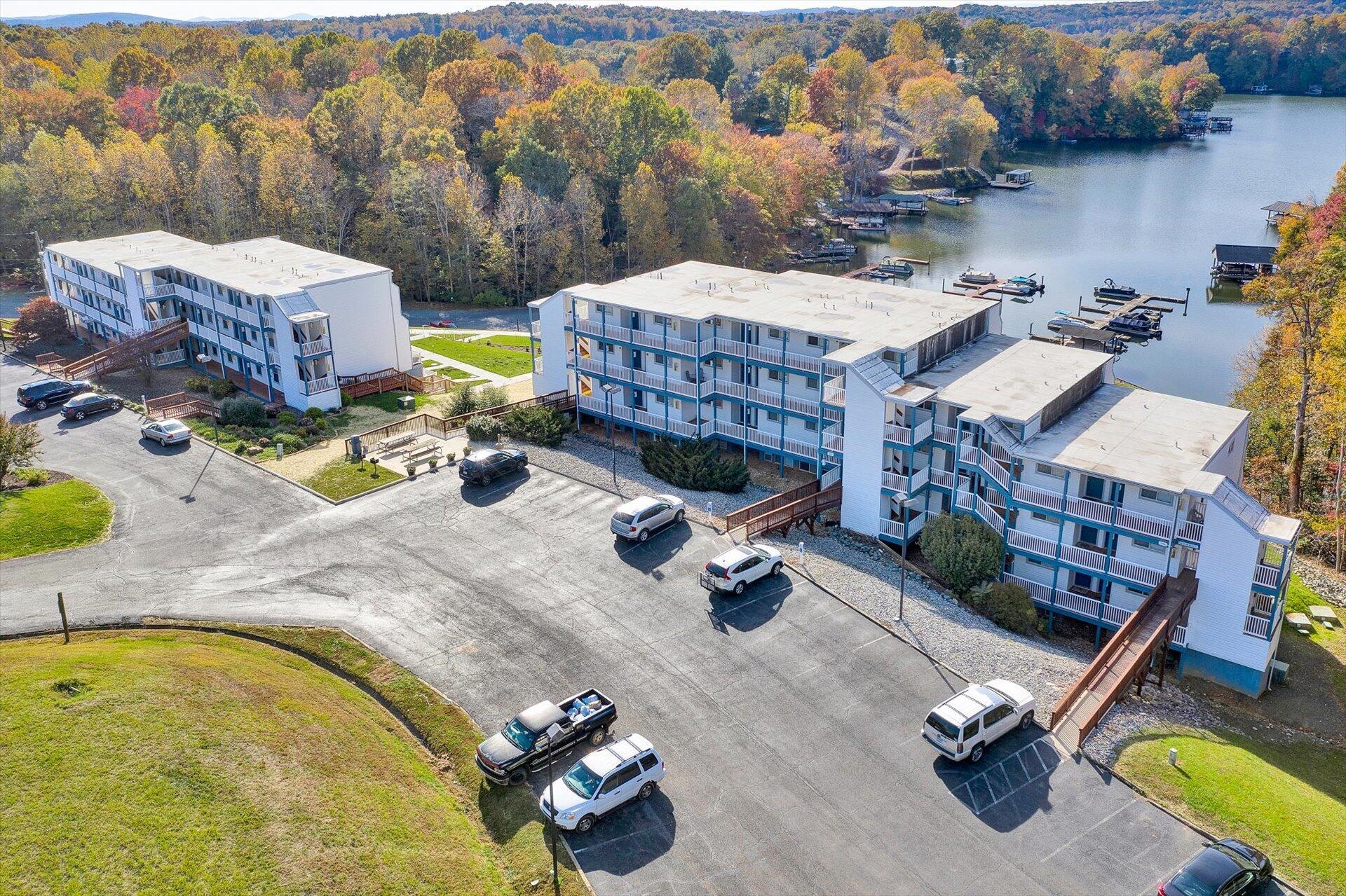 1089 Bluewater Drive, Unit 305 Moneta, VA 24121 - Photo 33 of 41 an aerial view of a swimming pool with outdoor seating