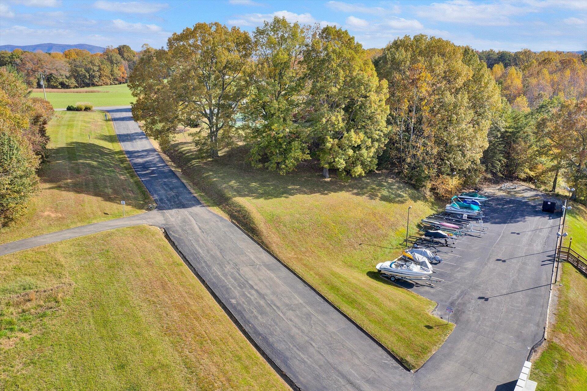 1089 Bluewater Drive, Unit 305 Moneta, VA 24121 - Photo 39 of 41 a view of a swimming pool with a yard