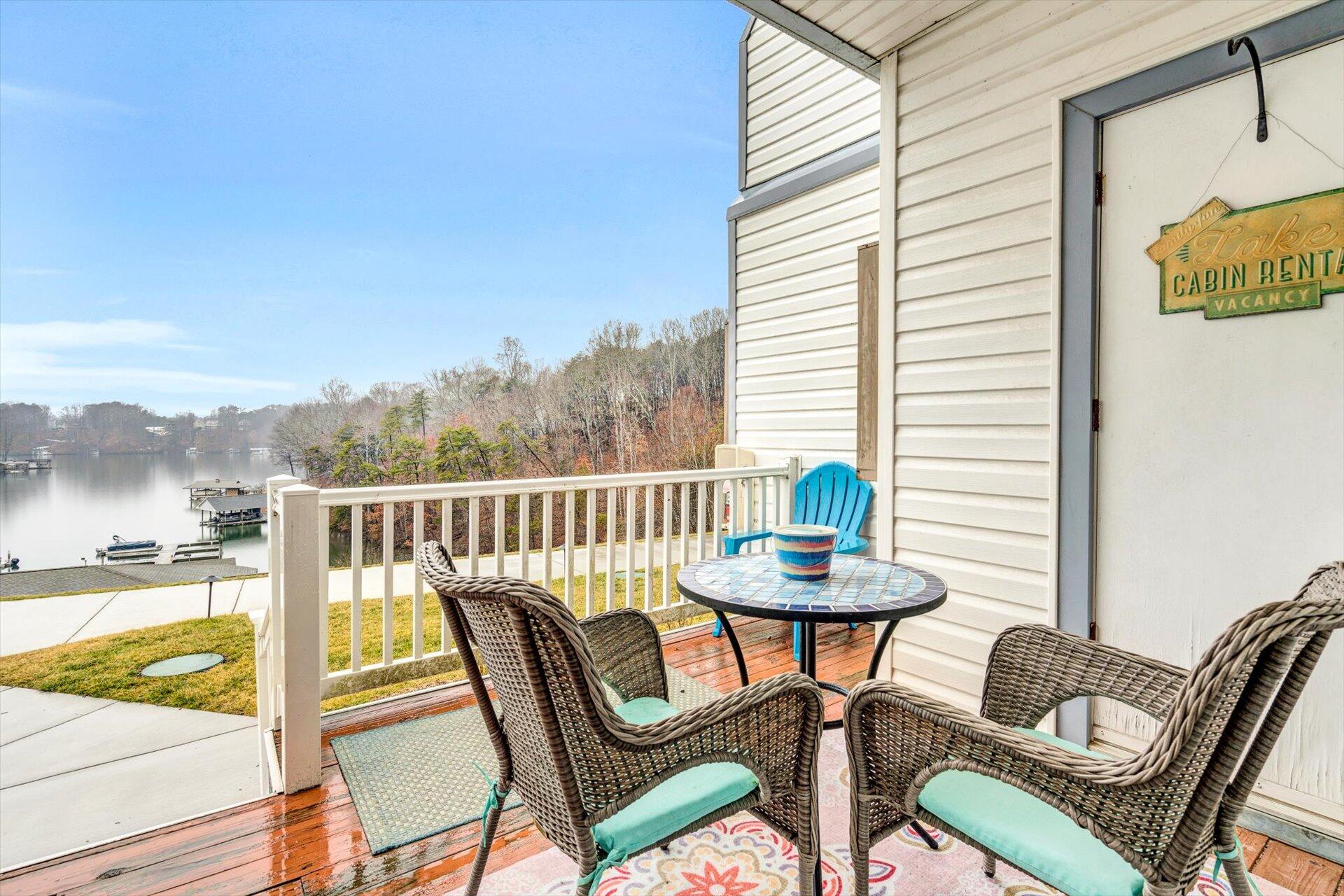 1089 Bluewater Drive, Unit 305 Moneta, VA 24121 - Photo 5 of 41 a view of a chairs and table in patio