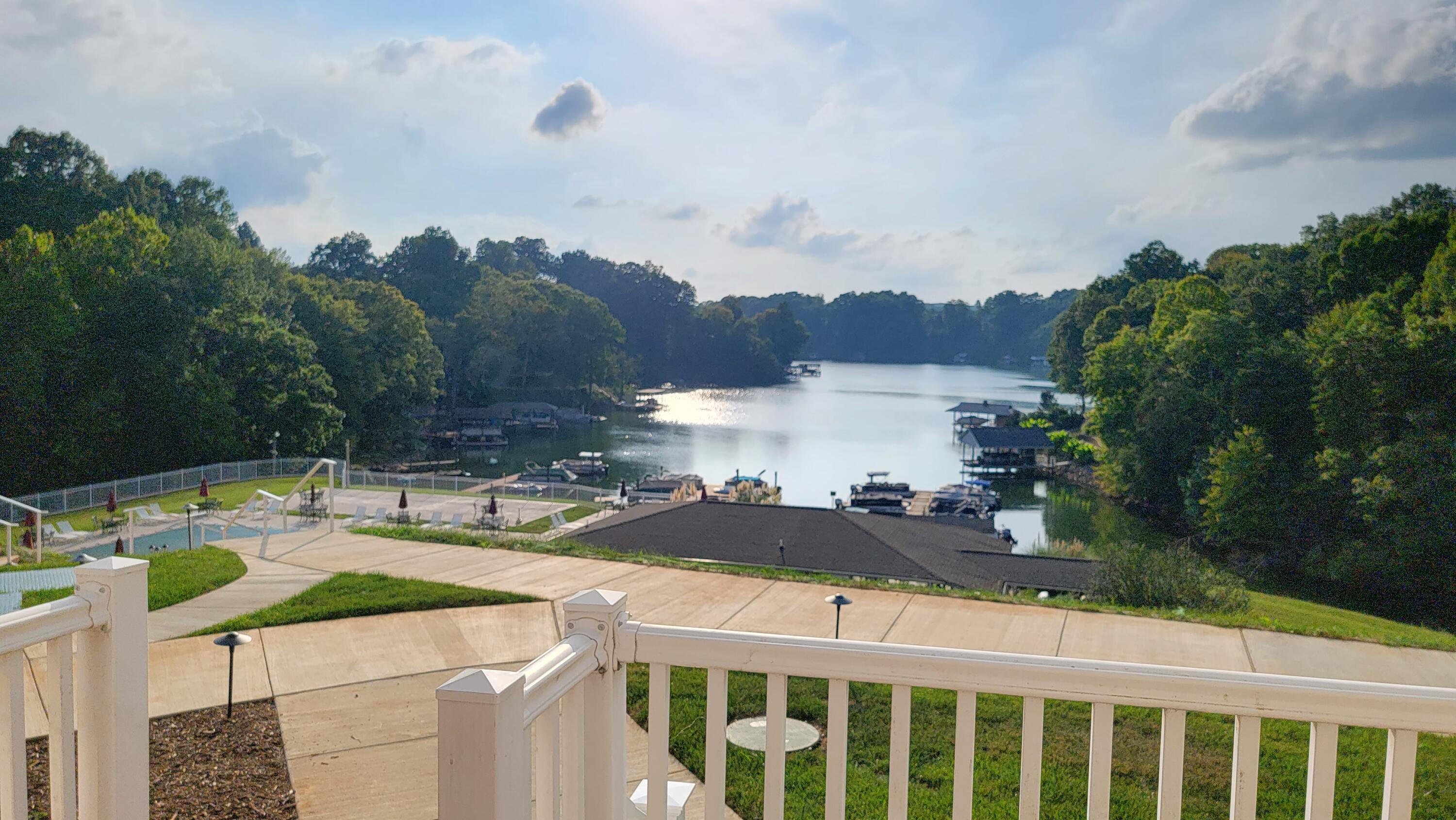 1089 Bluewater Drive, Unit 305 Moneta, VA 24121 - Photo 7 of 41 a view of a patio with a table and chairs