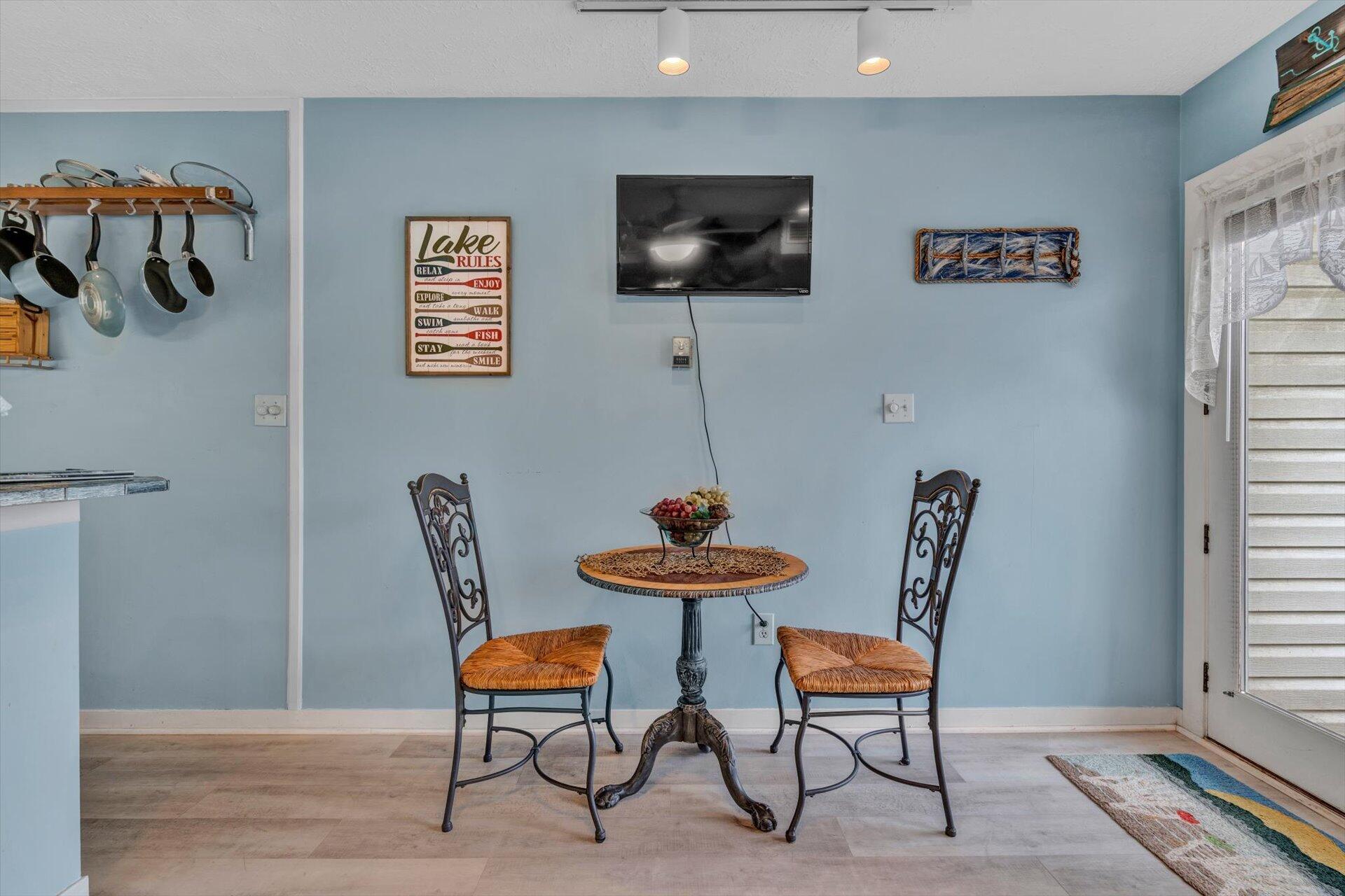 1089 Bluewater Drive, Unit 305 Moneta, VA 24121 - Photo 10 of 41 a room with furniture and a window