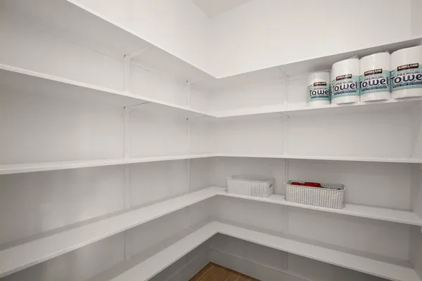 a view of an empty walk in closet