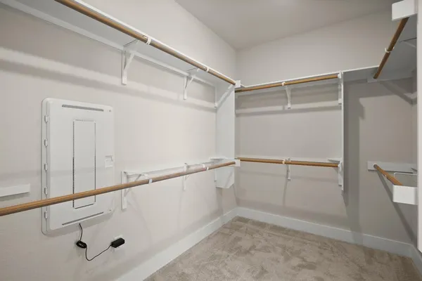 a view of an empty walk in closet