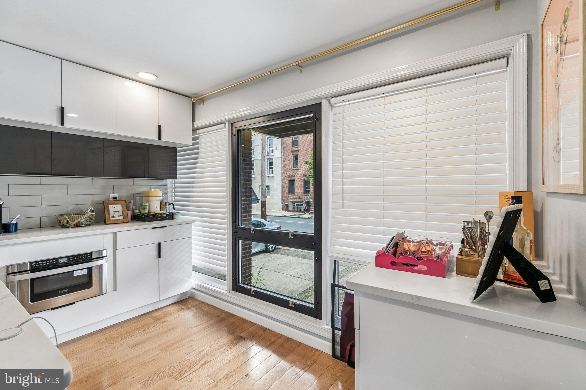 1130 Lombard Street Philadelphia, PA 19147 - Photo 9 of 45 a kitchen with a refrigerator and a sink