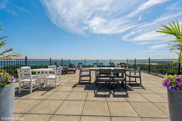 a view of a terrace with furniture