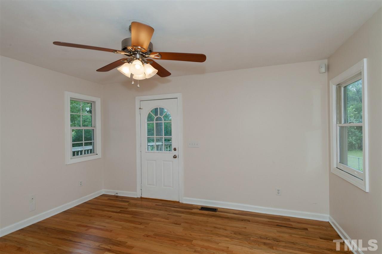 2313 Sheffield Road Raleigh, NC 27610 - Photo 20 of 25 a window in an empty room