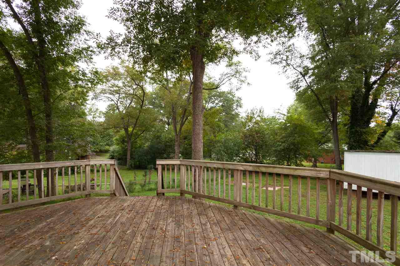 2313 Sheffield Road Raleigh, NC 27610 - Photo 23 of 25 a view of deck with a large trees