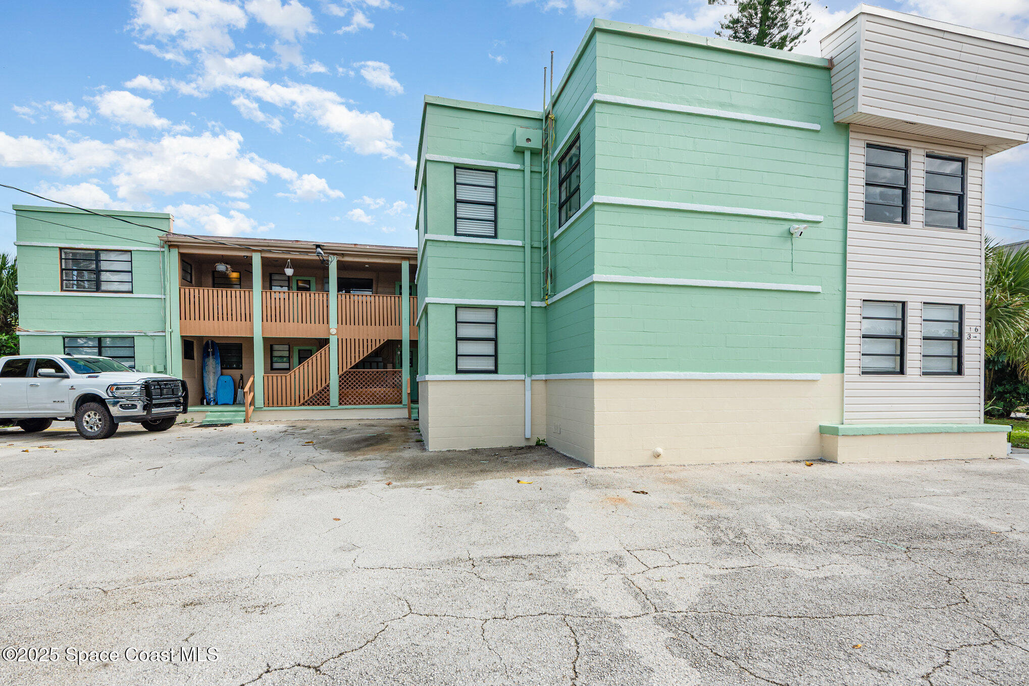 Undisclosed Address Cocoa Beach, FL 32931 - Photo 17 of 20 a view of house with outdoor space and porch