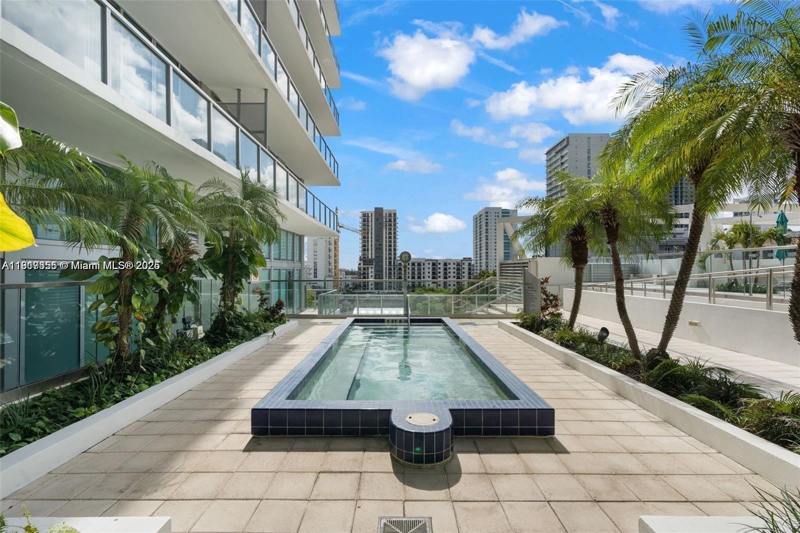 79 Southwest 12th Street, Unit 2204S Miami, FL 33130 - Photo 25 of 27 a view of outdoor space with swimming pool
