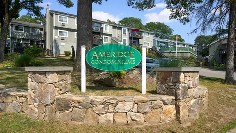 a sign board with parking space