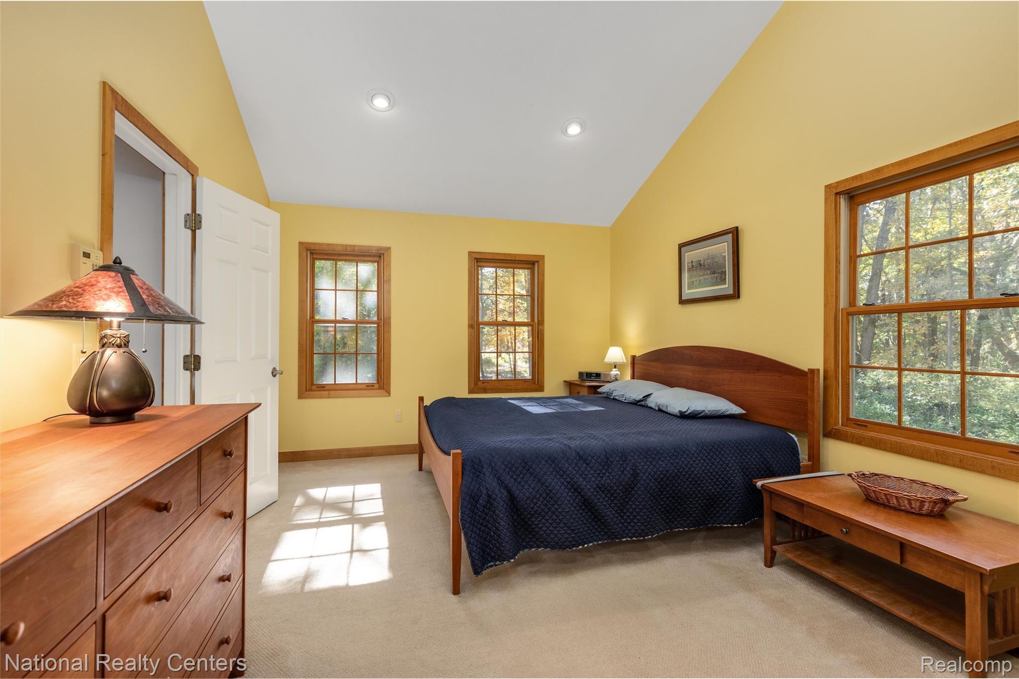 2322 Addaleen Road Highland, MI 48357 - Photo 34 of 54 Bedroom with light colored carpet, lofted ceiling, and recessed lighting