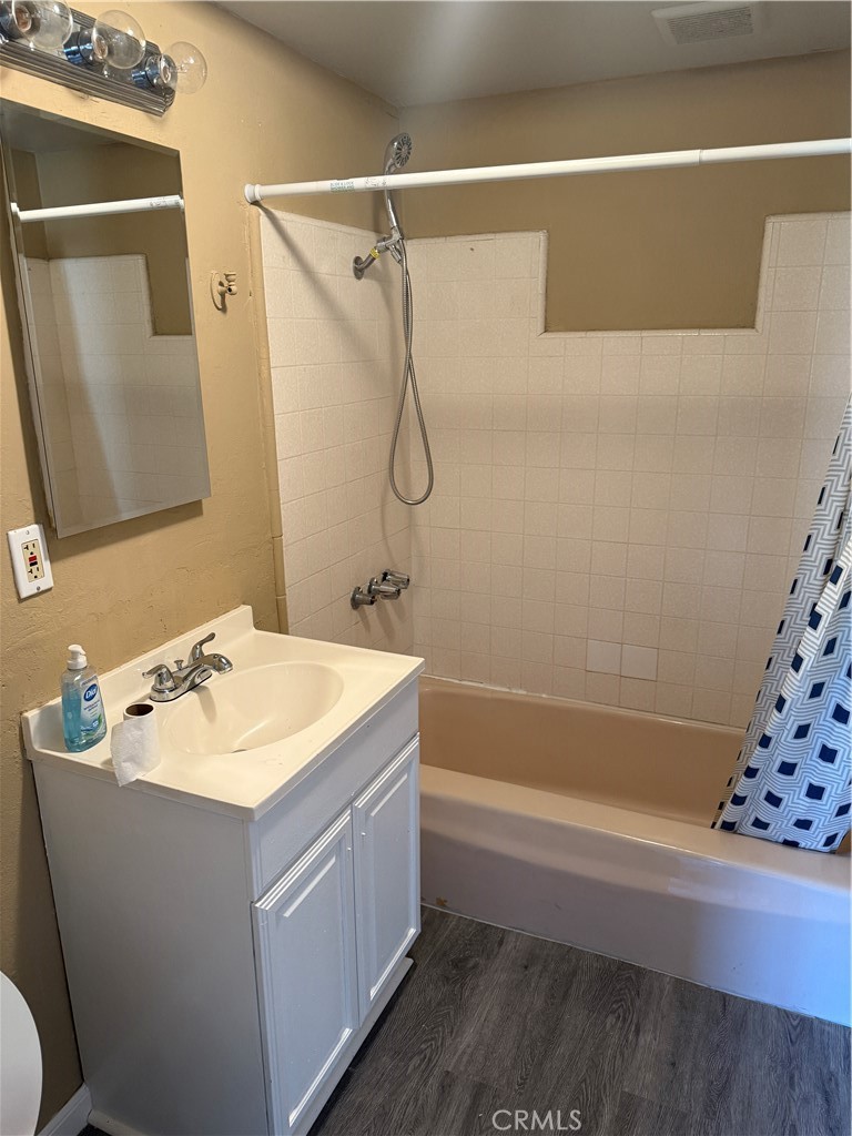 6030 Ocotillo Avenue Twentynine Palms, CA 92277 - Photo 6 of 10 a bathroom with a sink and a mirror
